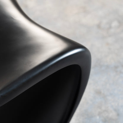 Black S-Shaped Plastic Chair