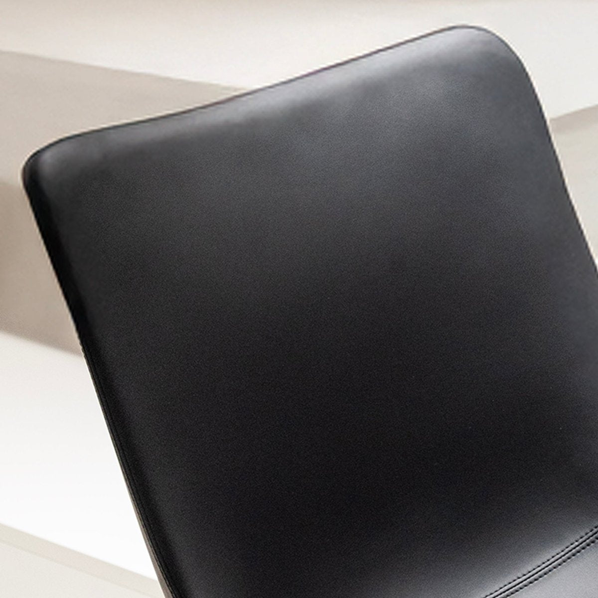 Contoured Black Leather Chair - FURNIBLE.